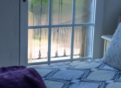 foggy bedroom window during a cold day