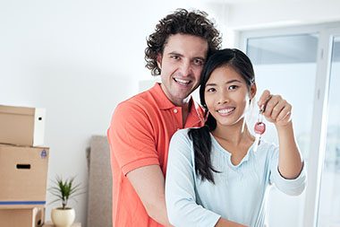 couple with house keys