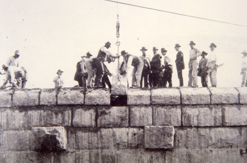 Workers building the Austin Dam