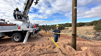 Austin Energy apprentice lineworker working in Navajo Nation