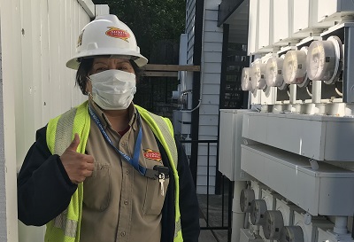 Austin Energy field crew member with mask
